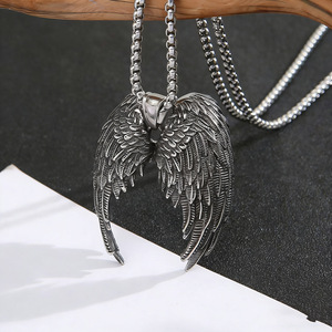 Yunnique – collier avec pendentif ailes d'ange en acier inoxydable pour hommes, design géométrique Vintage, bijoux cadeau - Product Image 1