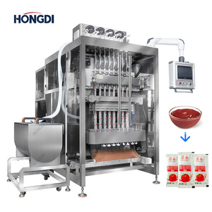Machine d'emballage semi-automatique à 8 colonnes en acier inoxydable (modèle le plus récent) spécialisée pour le remplissage et l'emballage de crèmes hydratantes et de crèmes pour les mains - Product Image 2