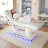 Lit de massage complet chauffant de haute qualité, durable, blanc, à 4 moteurs, avec réglage de la hauteur, design moderne et luxueux pour salon de beauté