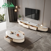 Meuble TV moderne de luxe en bois avec plateau en marbre et ensemble table basse assortie, doté d'une console beige et d'un design d'armoire flottante