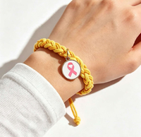 Bracelet rose pour la sensibilisation au cancer du sein en octobre, bracelet tressé à la main avec un ruban rose et un charme rond, bracelet en cordon tissé réglable