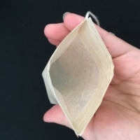 Sachet en papier filtre à thé avec cordon de serrage et étiquette