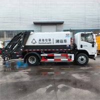 Camion à ordures compacté à énergie nouvelle, alimenté par batterie, SHACMAN 4*2, fabriqué en Chine.
