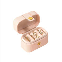 Étui de voyage pour bijoux en cuir PU mini portable prêt à être expédié avec bouton-pression, petite boîte à bijoux de voyage pour bagues et boucles d'oreilles