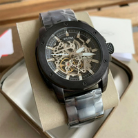 Montre automatique mécanique moderne pour homme en acier noir avec cadran squeletté et mouvement mécanique automatique