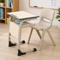 Ensemble chaise et bureau scolaire robuste et fixe, idéal pour les projets en classe, en académie et dans les centres d'apprentissage post-éducatifs