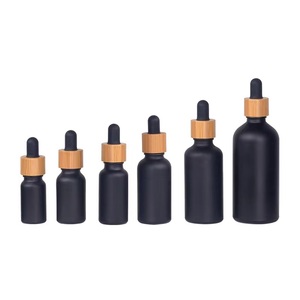 Chai Tinh Dầu Dưỡng Tóc Mỹ Phẩm Rỗng 30 Ml <span class=keywords><strong>1</strong></span> Oz Chai Nhỏ Giọt Thủy Tinh Màu Đen Mờ 30 Ml Có Nắp Tre - Product Image 1