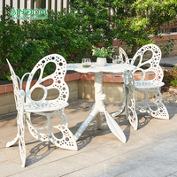 Ensemble de tables et chaises de salle à manger d'extérieur en alliage d'aluminium au design papillon de style européen créatif pour hôtels et cours
