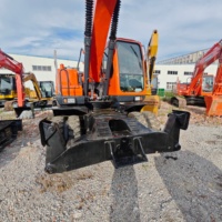 Vente en gros à bas prix, Excavatrice sur pneus d'occasion Doosan DX210W-9C d'origine, 20 tonnes, faible nombre d'heures de travail