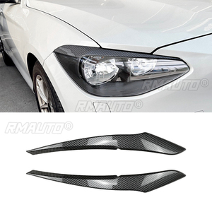 Autocollants pour les sourcils des phares avant de voiture, aspect noir brillant/carbone, pour BMW Série 1 F20 F21 2011-2014 - Product Image 1