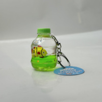 Porte-clés en acrylique avec bouteille flottante en forme de voilier bleu océan, dessin animé, exquis, cadeau pour enfants, injection d'huile liquide, bouteille à la dérive, vente en gros