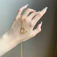 Collier en acier titane avec pendentif cœur évidé simple, nouvelle tendance, accessoire à pendentif de forme irrégulière