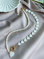 Collier ras du cou en perles et pendentifs coquillages nacrés de haute qualité pour femmes, idéal pour la mode estivale et la vente en gros