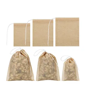 Bolsas de sobre de filtro de bolsita verde desechable biodegradable orgánica de grado alimenticio, organizador de té, bolsa de embalaje izquierda para té Suelto