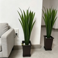 Vente en gros de plantes artificielles en plastique au toucher réel, tiges et racines de Cymbidium, verdure recyclable pour pot, vase, Noël, Pâques