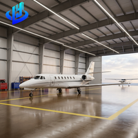 Hangar d'avion préfabriqué en structure acier à grande portée, sur mesure, pour le stockage de jets privés