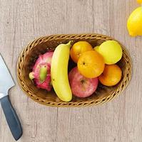 Op maat gemaakte groothandel goedkope voedselveilige handgeweven PP-wicker brood- en fruitmandje van plastic rotan voor thuisgebruik