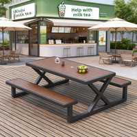 Ensemble table et chaises en plastique imitation bois en forme de X, pliable, mobile, design minimaliste moderne pour cafés commerciaux et cours.