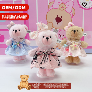 Orsetto di peluche personalizzabile OEM e ODM con vestito e fiocco, ideale come regalo per ragazze - Product Image 1