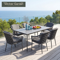 Ensemble de table et de chaises de salle à manger d'extérieur de luxe moderne, meubles de salle à manger en aluminium et corde pour hôtel, complexe hôtelier, villa, jardin