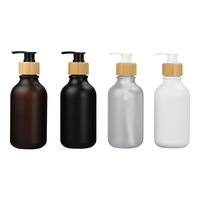 Produsen Botol Plastik 2026, Botol Pompa Lotion Bambu 500ml Custom, Botol Plastik Transparan Amber dengan Pompa Bambu