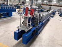 Machine de façonnage de cadre de porte de volet roulant de profil en acier