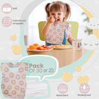 OEM personnalisé 20 pièces emballage individuel absorbant étanche tissu non tissé bavoir bébé jetable pour l'alimentation et les voyages