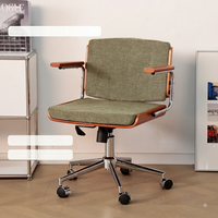 Chaise de bureau ergonomique de style nordique en fer avec réglage en hauteur et structure en acier pivotante