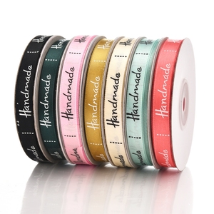 โรงงานขายส่งริบบิ้นผ้าซาตินเนื้อเรียบ 100% โพลีเอสเตอร์ แบบหน้าเดียว/สองหน้า สีน้ำตาลช็อกโกแลต - Product Image 1