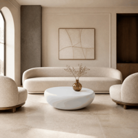Table basse moderne en pierre blanche, ronde et sculpturale, personnalisable pour salon de villa