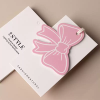 Étiquettes suspendues en carton personnalisées en forme de nœud rose avec code-barres pour chaussettes, chaussures, vêtements et étiquettes de vêtements – Vente en gros