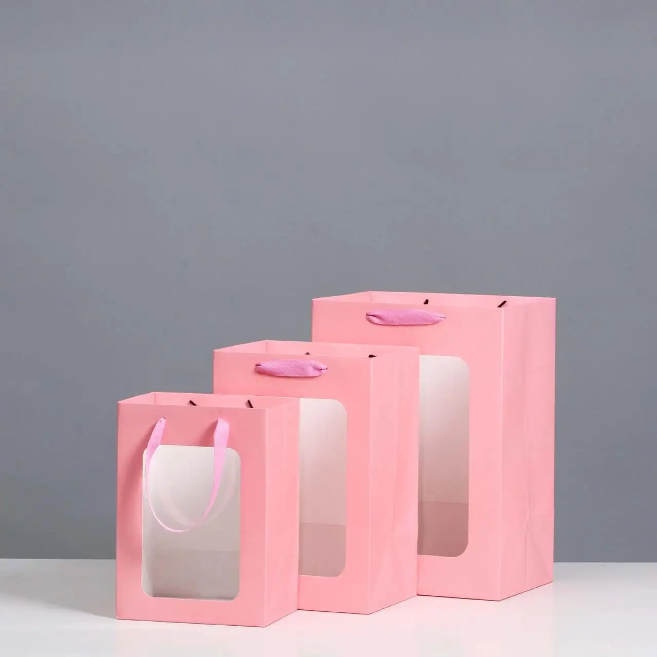 China Lieferant Custom Pink Candy Kosmetik Souvenir Papier Kraft Taschen mit Ihrem eigenen Logo