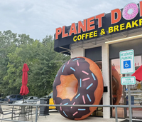 La publicité extérieure géant gonflable beignet ballon chocolat accessoires alimentaires sucrés gonflables