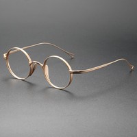 Lunettes optiques rondes tendance anti-lumière bleue pour la lecture et l'utilisation informatique, motif uni, verres AC, monture sans cerclage, demi-monture