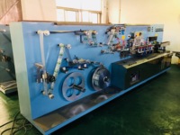 Machine à fabriquer des tubes souples en aluminium-plastique pour dentifrice