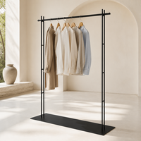 Porte-vêtements sur pied en métal noir mat, présentoir à vêtements à double tube, base pleine longueur, personnalisable en usine