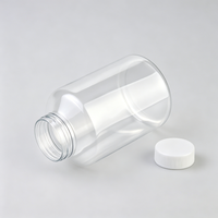 Pot en plastique transparent à large ouverture de 700 ml avec bouchon à vis moleté vertical blanc pour l'emballage de friandises pour animaux de compagnie et d'aliments secs
