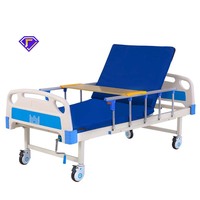 Lit médical Kangluo modèle LOF-897 à double manivelle manuelle avec barrière de sécurité pour patients à mobilité réduite