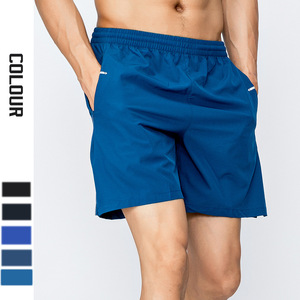 XIANGYU Short de gymnastique athlétique pour hommes décontracté <span class=keywords><strong>bleu</strong></span> Polyester taille élastique Short de course avec poches pantalon court à motif solide - Product Image 1