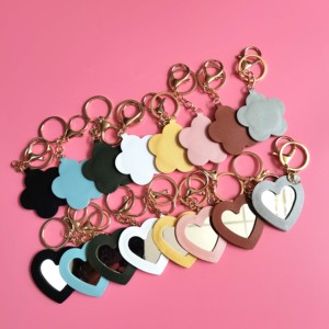 Espejo de Maquillaje de Mano con Llavero, Mini Espejo de Maquillaje Redondo Portátil de Bolsillo para Viajes, Herramienta Cosmética de Belleza - Product Image 1