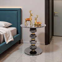Table d'appoint d'angle mobile en pierre microcristalline et fer forgé, style moderne et luxueux, pour chevet ou salon