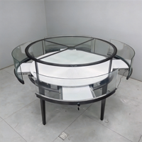 Moderne Runde Schwarze Edelstahl-Schmuckvitrine mit Rotierendem LED-Licht Glasinselschrank für Einzelhandel und Boutiquen