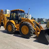 Chargeuse-pelleteuse JCB4CX d'occasion à 4 roues motrices, haute efficacité de travail, avec moteur, boîte de vitesses, pompe - Modèle 2023, capacité de charge nominale de 3 tonnes