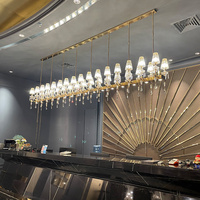 Lustre en cristal de luxe pour restaurant, design en bande longue, simple et créatif, luminaire suspendu pour comptoir de bar