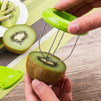 Kiwi Schiller & Schepje 2-in-1 Fruitopener, RVS/Plastic, Verdikte uitvoering, Schep, Eet, Zonder knoeien, Snel & Gemakkelijk