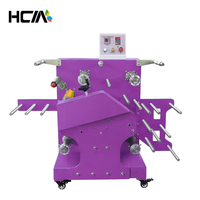 Machine de transfert thermique à rouleaux pour impression par sublimation automatique de rubans et de calendriers, avec dispositif de séparation de couvertures
