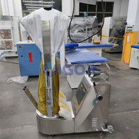 Machine à repasser et à vapeur automatique pour vêtements et chemises