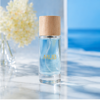 Flacon de parfum vide rond transparent de luxe personnalisé 50 ml avec pulvérisateur à pompe, sérigraphie et bouchon en bois pour diffuseur à bâtonnets – Meilleures ventes