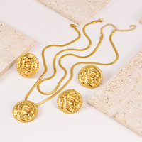 Parure de bijoux en acier inoxydable plaqué or 18 carats avec serpent et éléphant, collier chaîne chevrons et pendentif animal en relief vintage pour femme