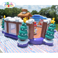 Parc de jeux gonflable de Noël en forme de cabane d'hiver, maison de jeu gonflable à thème de Noël pour enfants avec toboggan pour fêtes et divertissements